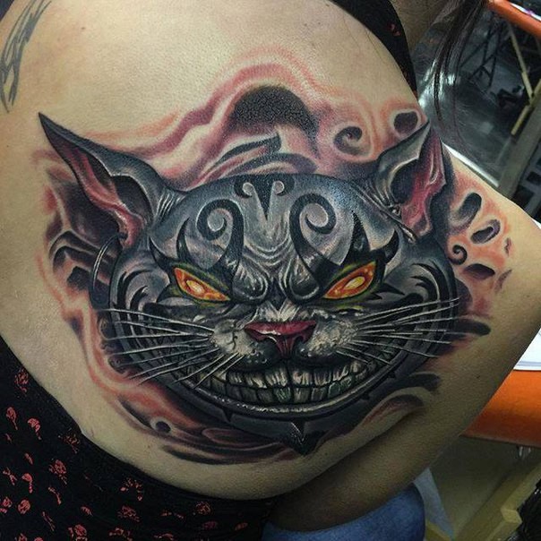 Cartoon style colored scapular tattoo of creepy cat
