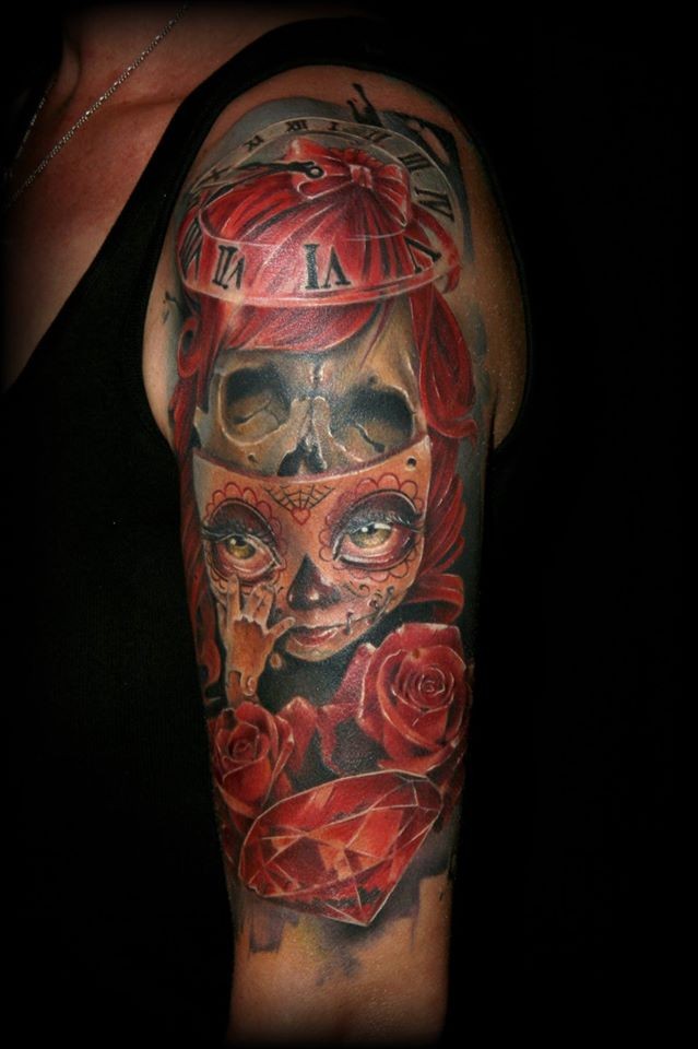Cartoon style colored shoulder tattoo of creepy doll with clock and flowers