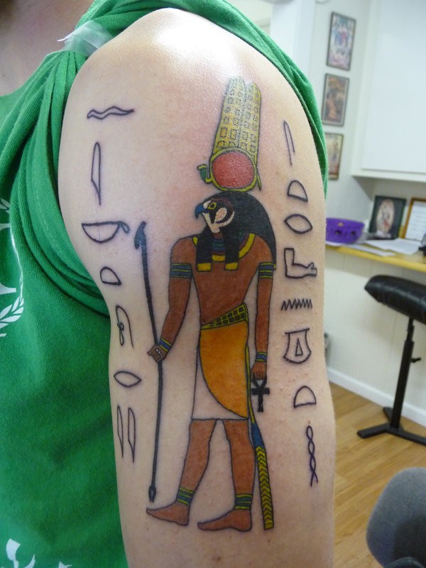 Cartoon style colored shoulder tattoo of Egypt wall paintings