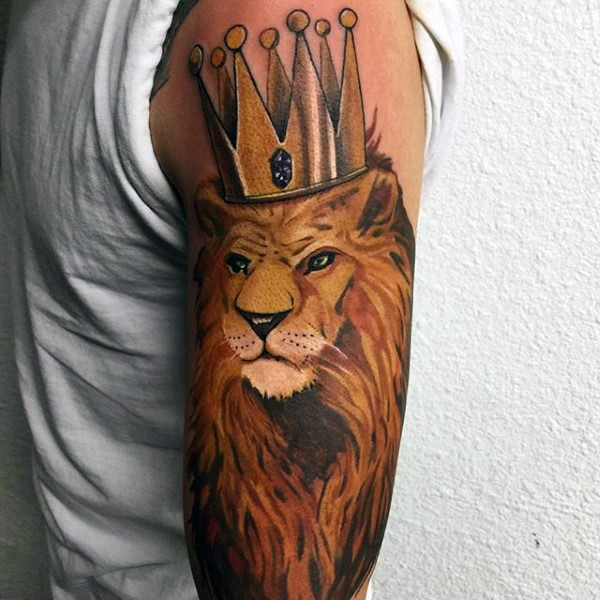 Cartoon style colored shoulder tattoo of king lion