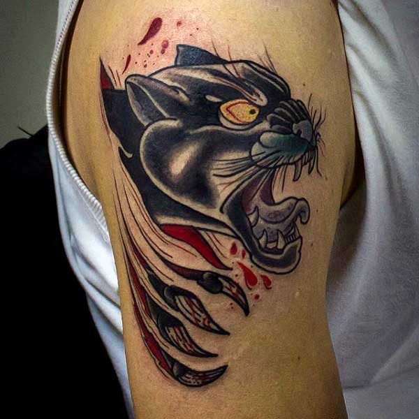 Cartoon style colored shoulder tattoo of black panther