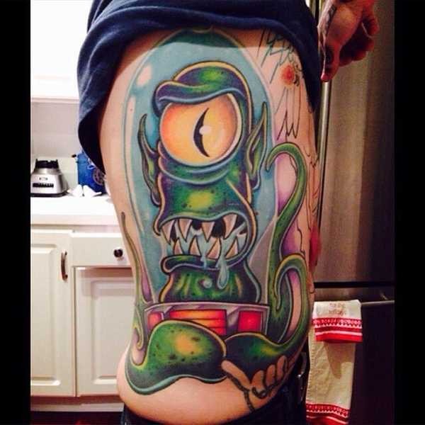 Cartoon style colored side tattoo of creepy alien