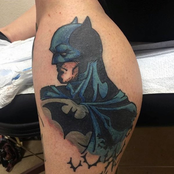 Cartoon style colored tattoo of Batman with flying bats