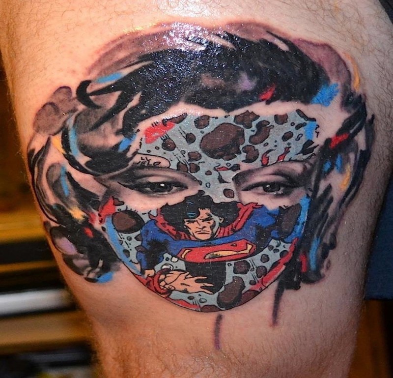 Cartoon style colored thigh tattoo of woman face with superman