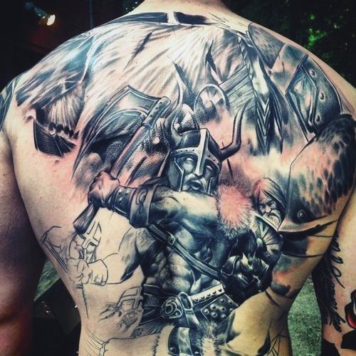 Cartoon style colored whole back tattoo of fantasy warriors