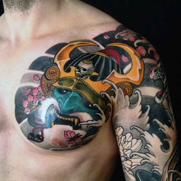 Cartoon style colorful Asian warrior helmet tattoo on chest and shoulder