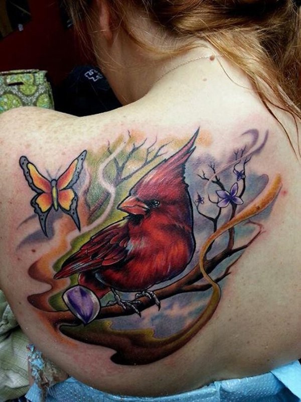 Cartoon style painted sweet colored big bird with butterfly tattoo on shoulder