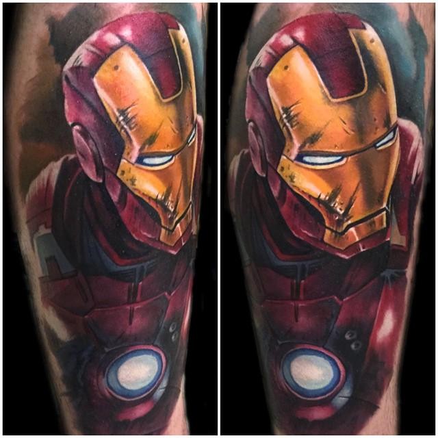 Cartoon style traditionally colored Iron man tattoo on half sleeve zone