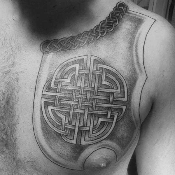 Celtic style black ink chest tattoo of medieval armor