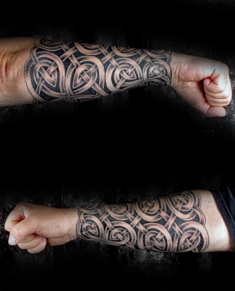 Celtic style black ink forearm tattoo of big knots