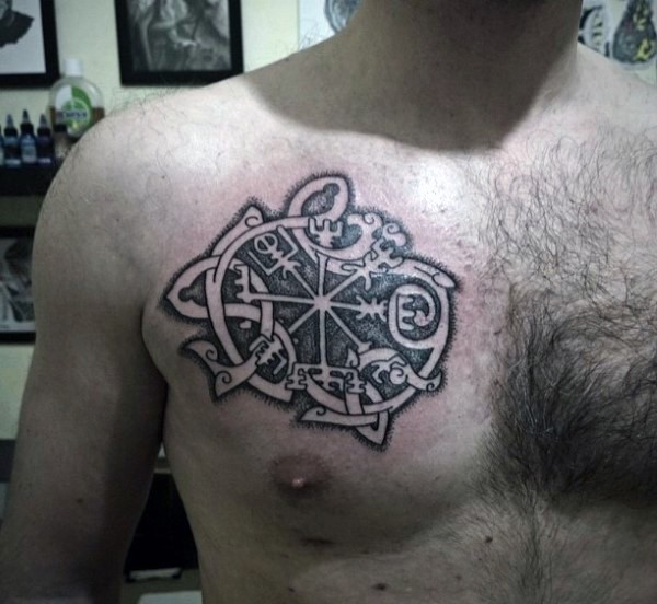 Celtic style colored chest tattoo of interesting ornaments