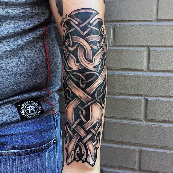 Celtic style colored forearm tattoo of various knots
