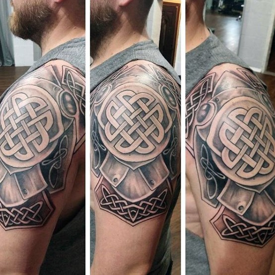 Celtic style colored shoulder tattoo of medium armor