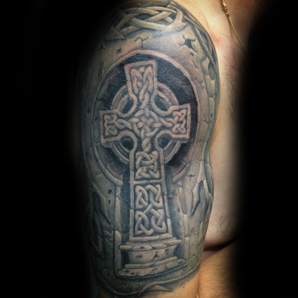 Celtic style colored shoulder tattoo of big stone cross