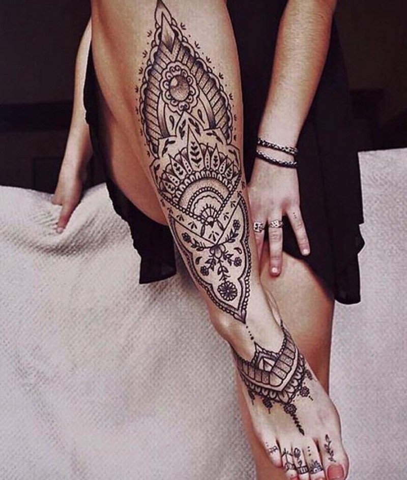 Charming Henna style Hinduism ornament tattoo with floral motifs tattoo on leg, foot and toes