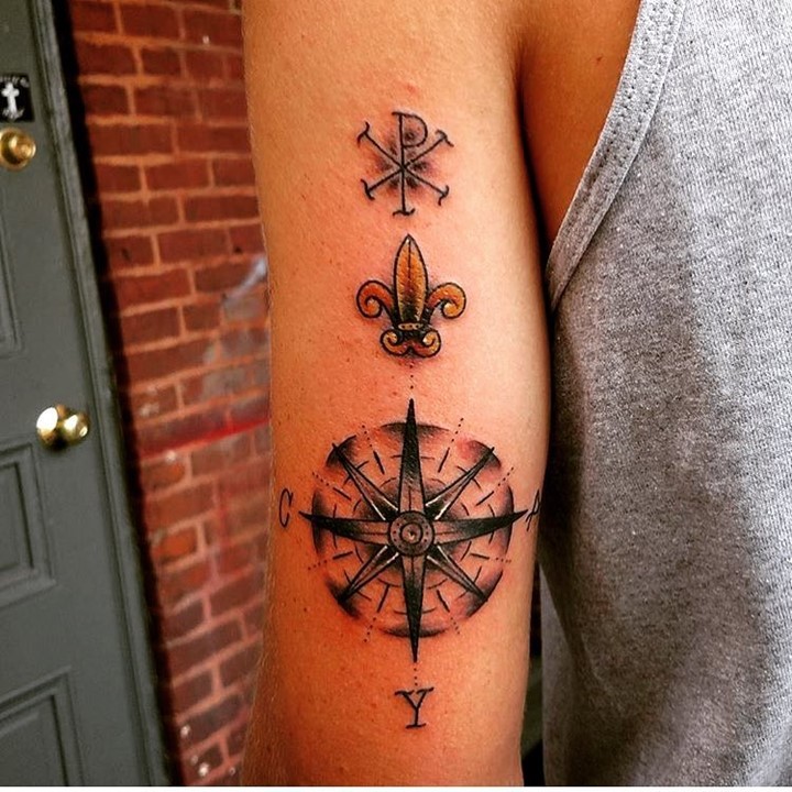 Chi Rho, Fleur De Lis and wind rose special symbols tattoo on shoulder