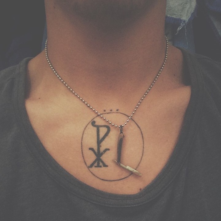 Chi Rho special religious symbol Christ monogram in circle sternum tattoo