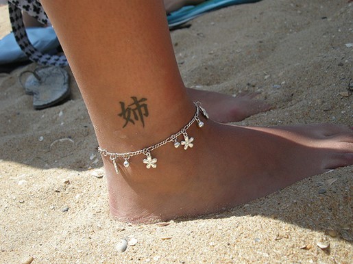 Chinese symbol tattoo on ankle