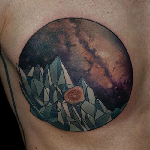 Circle shaped colored illustrative style chest tattoo of space mountain