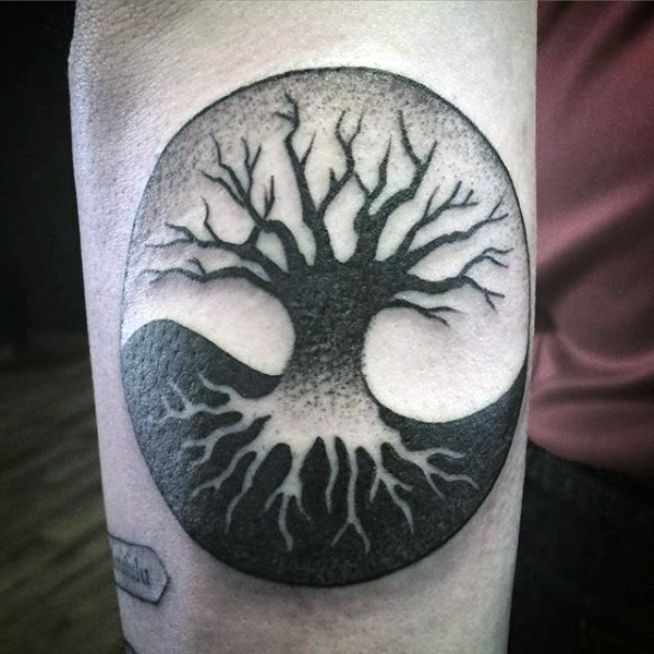 Circle shaped dot style forearm tattoo of mystical tree