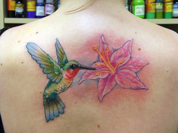 Classic hummingbird tattoo on back