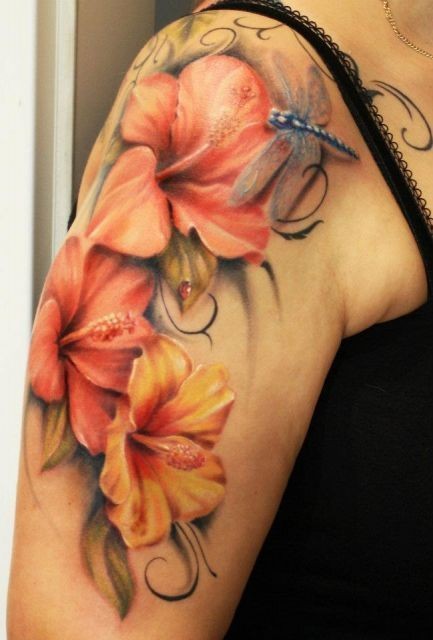 Tatuaggio sul braccio i fiori & la farfalla