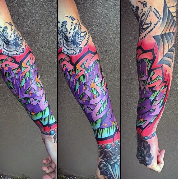 Colored arm tattoo of incredible looking lettering