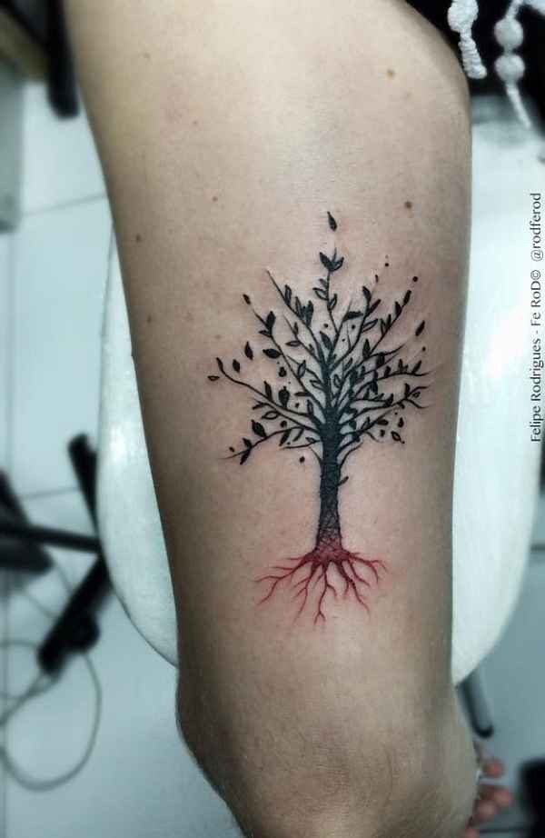Colored arm tattoo of small tree