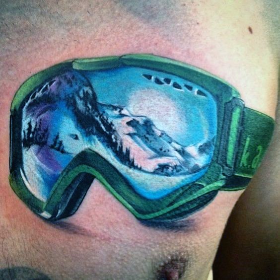 Colored chest tattoo of skiing man mask