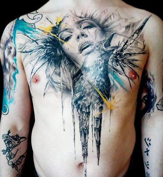 Colored chest tattoo of woman face with crow