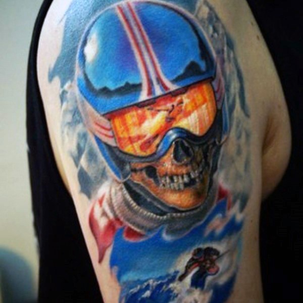Colored creepy looking shoulder tattoo of skiing skeleton
