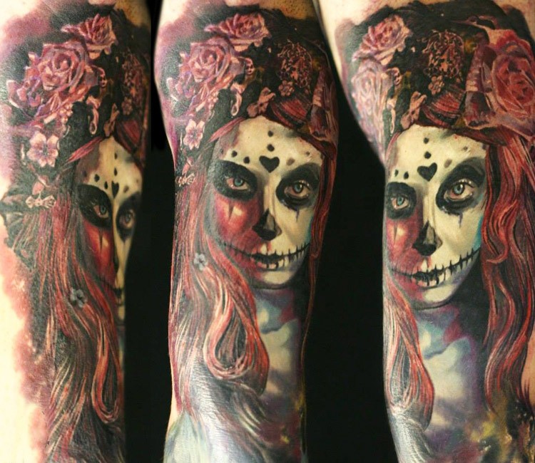 Colored detailed arm tattoo of mystical woman with flowers