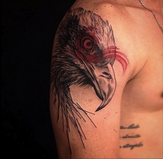 Colored engraving style shoulder tattoo of eagle head