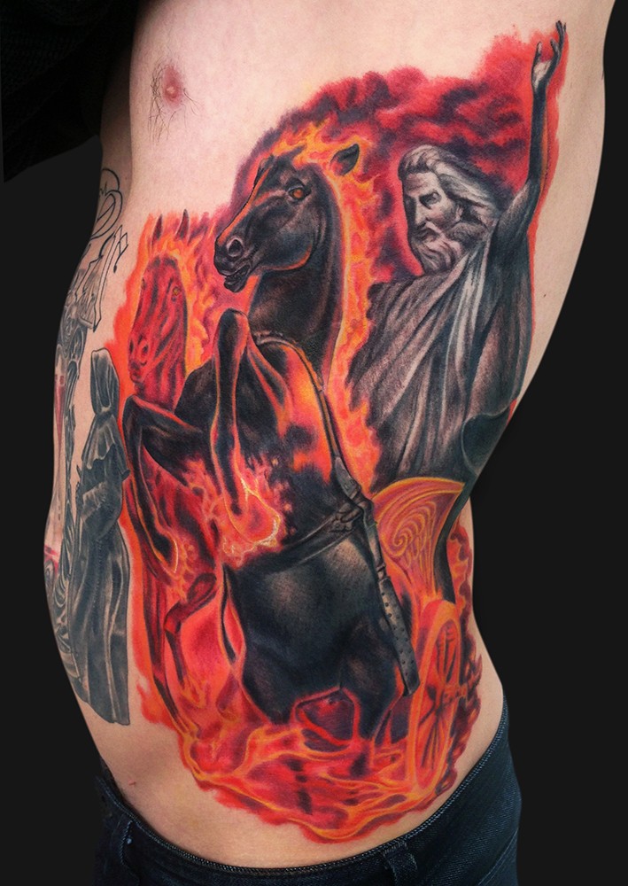 Colored fantasy style side tattoo of horse rider with flames