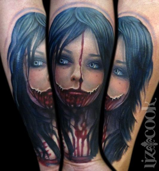 Colored forearm tattoo of bloody woman