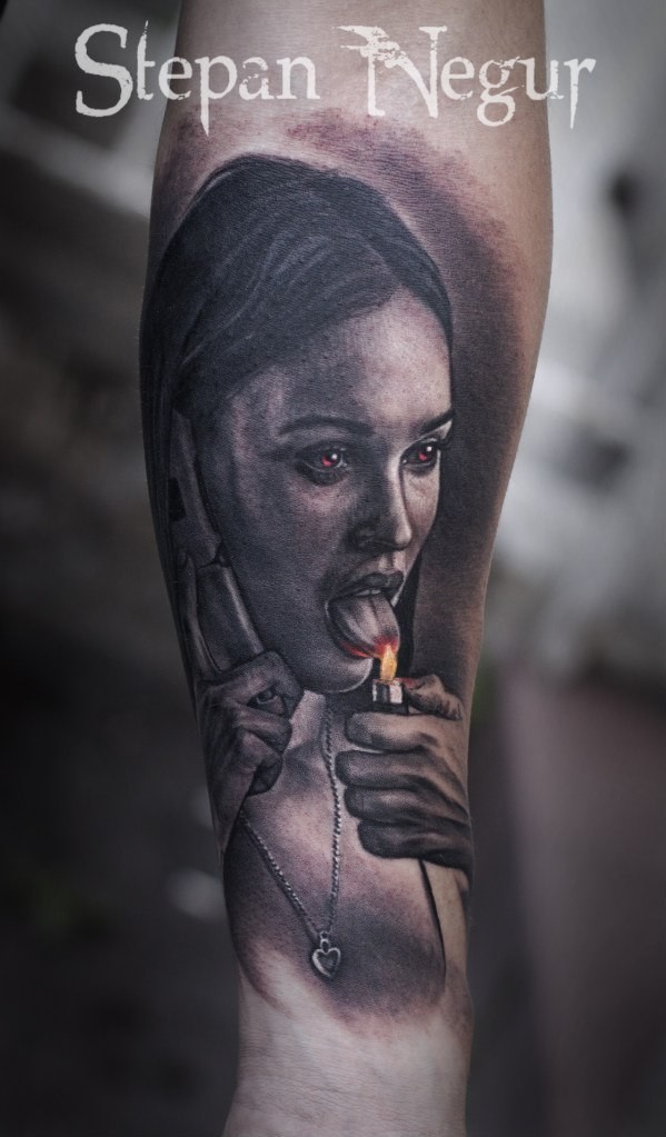 Colored forearm tattoo of creepy woman with lighter