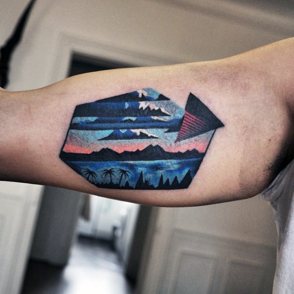 Colored geometrical style biceps tattoo of cool shaped picture