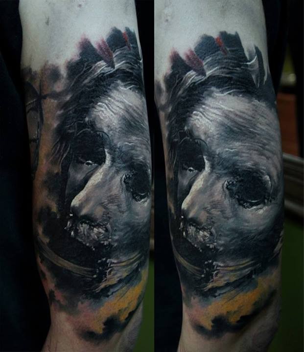 Colored horror style creepy looking arm tattoo of monster face