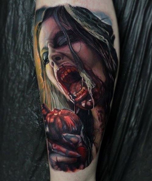 Colored horror style creepy looking arm tattoo of bloody woman with heart