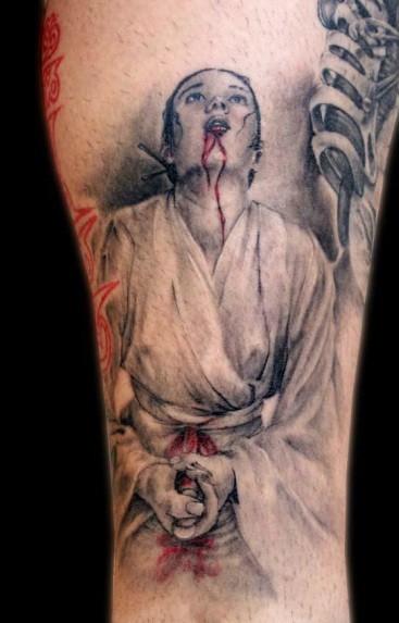 Colored horror style creepy looking bloody samurai woman tattoo
