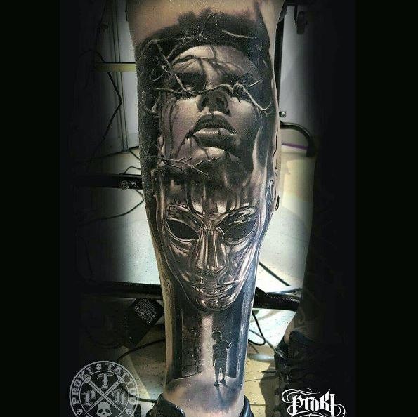 Colored horror style detailed leg tattoo of woman face with vine and mask