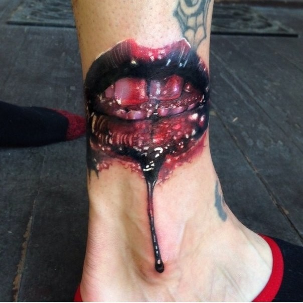 Colored horror style leg tattoo of bloody leaps