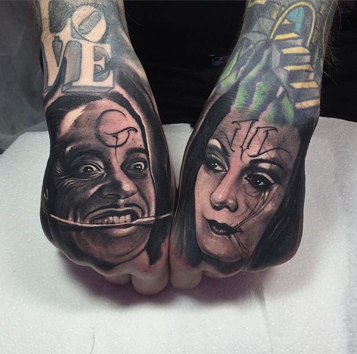 Colored horror style man and woman portraits tattoo on hands