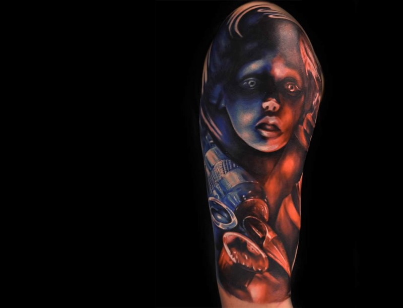 Colored horror style shoulder tattoo of creepy girl portrait