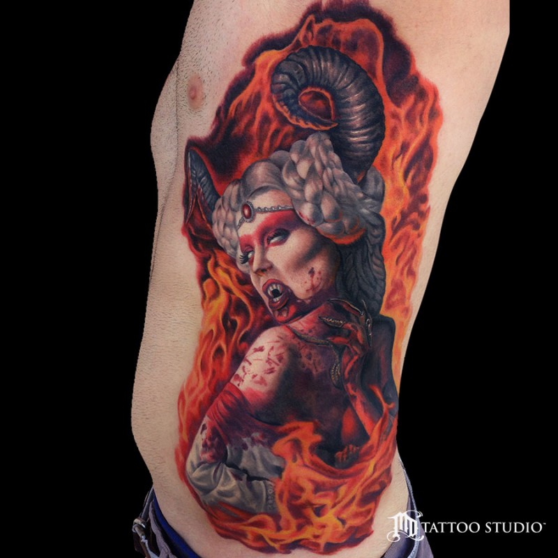 Colored horror style side tattoo of bloody devils woman with flames