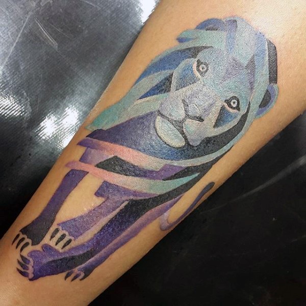 Colored illustrative style colored lion tattoo on forearm