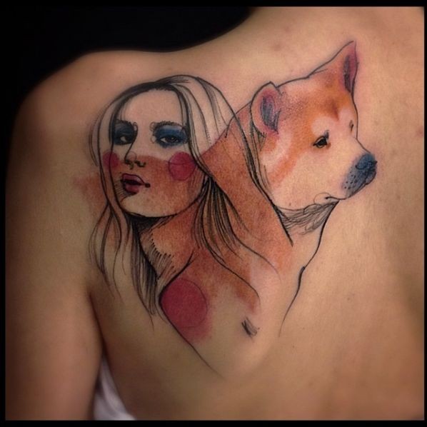 Colored illustrative style scapular tattoo of woman with sad dog