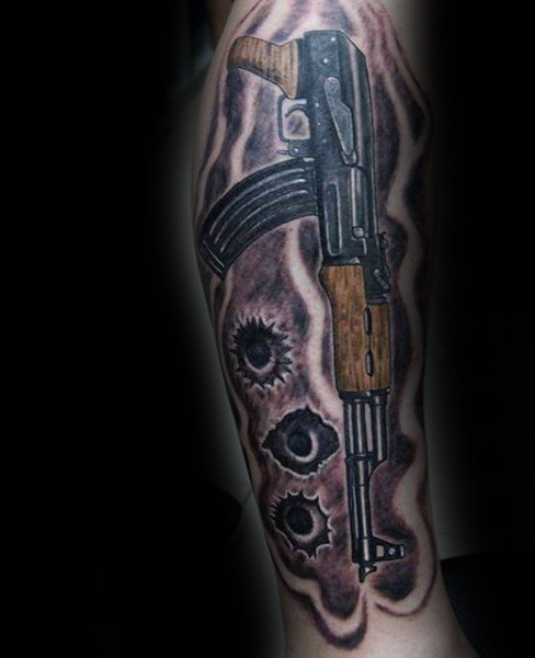 Colored illustrative style tattoo of AK rifle with bullet holes