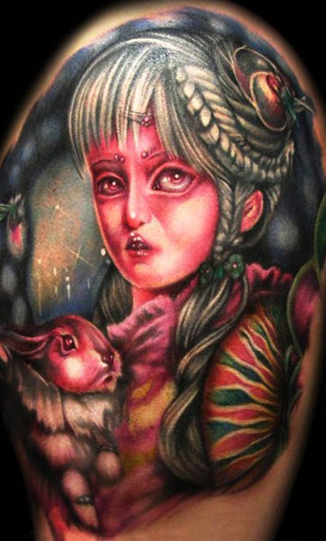 Colored illustrative style tattoo of fantasy woman with rabbit