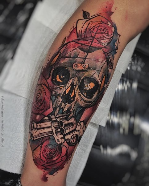 Colored leg tattoo of mystical man skull with pistols and roses
